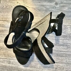 Guess Metallic gold/black heels like new used one time in a fashion show…